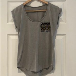 Tee with pocket detail